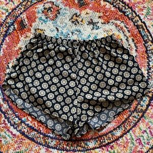 Flowy dress shorts w/ medallion pattern.